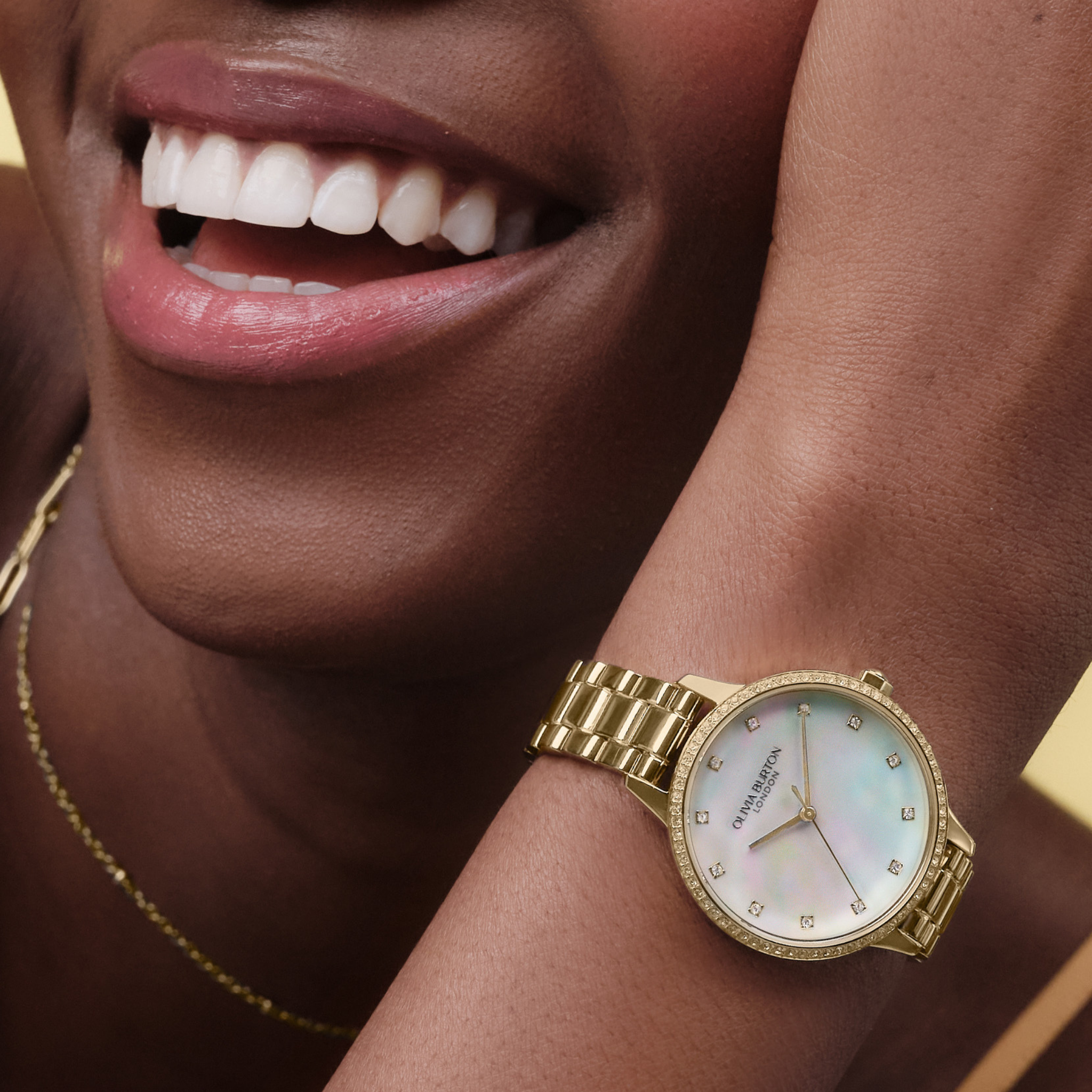 Womens Olivia Burton Gold/Pearlized Dial Captivate Bracelet Watch